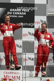 13.06.2004 Montreal, Canada, F1, Sunday, June, Michael Schumacher, GER, Ferrari and Rubens Barrichello, BRA, Ferrari - Formula 1 World Championship, Podium, Rd 8, Canadian Grand Prix, Canada, CAN