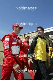 13.06.2004 Montreal, Canada, F1, Sunday, June, Michael Schumacher, GER, Ferrari and Timo Glock, GER, Test Driver Jordan - Formula 1 World Championship, Rd 8, Canadian Grand Prix, Canada, CAN