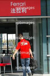 24.09.2004 Shanghai, China, F1, Friday, September, Michael Schumacher, GER, Ferrari arrives at work - Formula 1 World Championship, Rd 16, Chinese Grand Prix, CHN, China