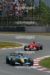 09.05.2004 Barcelona, Spain, F1, Sunday, May, Jarno Trulli, ITA, Mild Seven Renault F1 Team, R24, Action, Track  - Formula 1 World Championship, Rd 5, Marlboro Spanish Grand Prix Race, ESP