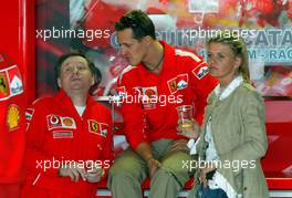 08.05.2004 Barcelona, Spain, F1, Saturday, May, celebrating the 200st GP in the Ferrari Box with the team, Jean Todt, FRA, Ferrari, Teamchief, General Manager, GES, Michael Schumacher, GER, Ferrari, Corina Schumacher, GER, Corinna, wife of Michael Schumacher, Portrait - Formula 1 World Championship, Rd 5, Marlboro Spanish Grand Prix,  ESP