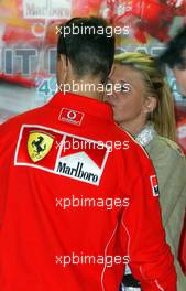 08.05.2004 Barcelona, Spain, F1, Saturday, May, celebrating the 200st GP in the Ferrari Box with the team, Michael Schumacher, GER, Ferrari, Corina Schumacher, GER, Corinna, wife of Michael Schumacher, Portrait - Formula 1 World Championship, Rd 5, Marlboro Spanish Grand Prix,  ESP