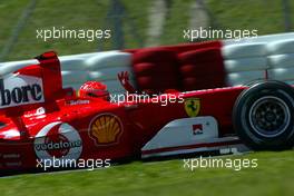 08.05.2004 Barcelona, Spain, F1, Saturday, May, Michael Schumacher, GER, Scuderia Ferrari Marlboro, F2004, Action, Track, is waving to the fans - Formula 1 World Championship, Rd 5, Marlboro Spanish Grand Prix Qualifying,  ESP
