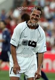 12.07.2004 Faro, Portugal, Michael Schumacher, GER, Ferrari - Michael Schumacher, Formula One World Champion, plays in the 2004 ALLSTARS GAME at the Algarve Stadium (Faro/Loule) on July 12th - Funds raised will go to LUIS FIGO FOUNDATION and LAUREUS SPORT FOR GOOD FOUNDATION