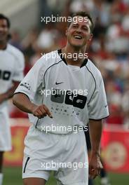 12.07.2004 Faro, Portugal, Michael Schumacher, GER, Ferrari - Michael Schumacher, Formula One World Champion, plays in the 2004 ALLSTARS GAME at the Algarve Stadium (Faro/Loule) on July 12th - Funds raised will go to LUIS FIGO FOUNDATION and LAUREUS SPORT FOR GOOD FOUNDATION