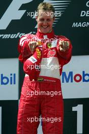 04.07.2004 Magny Cours, France, F1, Sunday, July, Michael Schumacher, GER, Ferrari - Formula 1 World Championship, Podium, Rd 10, Grand Prix de France, Circuit Nevers, FRA