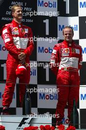 04.07.2004 Magny Cours, France, F1, Sunday, July, Michael Schumacher, GER, Ferrari, Rubens Barrichello, BRA, Ferrari - Formula 1 World Championship, Podium, Rd 10, Grand Prix de France, Circuit Nevers, FRA