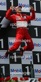 04.07.2004 Magny Cours, France, F1, Sunday, July, Michael Schumacher, GER, Ferrari, Portrait, JUMPS - Formula 1 World Championship, Podium, Rd 10, Grand Prix de France, Circuit Nevers, FRA