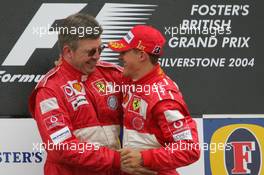 11.07.2004 Silverstone, England, F1, Sunday, July, Ross Brawn, GBR, Ferrari, Technical Director, Michael Schumacher, GER, Ferrari - Formula 1 World Championship, Rd 11, British Grand Prix, Podium, Silverstone, GBR