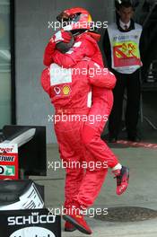 11.07.2004 Silverstone, England, F1, Sunday, July, Michael Schumacher, GER, Ferrari, Ross Brawn, GBR, Ferrari, Technical Director, Portrait  at Park Ferme - Formula 1 World Championship, Rd 11, British Grand Prix, Podium, Silverstone, GBR