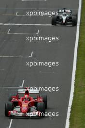 11.07.2004 Silverstone, England, F1, Sunday, July, Michael Schumacher, GER, Ferrari, Kimi Raikkonen, FIN, Räikkönen, West McLaren Mercedes, MP4-19B, Action, Track - Formula 1 World Championship, Rd 11, British Grand Prix, Race, Silverstone, GBR