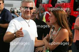 23.07.2004 Hockenheim, Germany,  F1, Friday, Willi Weber (GER), Driver Manager, making jokes with a girl - Formula 1 World Championship, Rd 12, Grosser Mobil 1 Preis von Deutschland, GER, Hockenheimring Baden-Württemberg