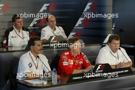 23.07.2004 Hockenheim, Germany, F1, Friday, July- Mario Theissen, Dr., GER, BMW Motorsport Director with Paolo Martinelli, ITA, Ferrari, engine development and Norbert Haug, GER, Mercedes, Motorsport chief - Formula 1 World Championship, Rd 12, Official FIA Press Conference, Grosser Mobil 1 Preis von Deutschland, GER, Hockenheimring Baden-Württemberg