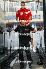 23.07.2004 Hockenheim, Germany, F1, Friday, July, Michael Schumacher, GER, Ferrari jumps on top of David Coulthard, GBR, McLaren Mercedes - Formula 1 World Championship, Rd 12, Grosser Mobil 1 Preis von Deutschland, GER, Hockenheimring Baden-Württemberg