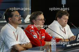 23.07.2004 Hockenheim, Germany, F1, Friday, July- Mario Theissen, Dr., GER, BMW Motorsport Director with Paolo Martinelli, ITA, Ferrari, engine development and Norbert Haug, GER, Mercedes, Motorsport chief - Formula 1 World Championship, Rd 12, Official FIA Press Conference, Grosser Mobil 1 Preis von Deutschland, GER, Hockenheimring Baden-Württemberg