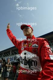 23.07.2004 Hockenheim, Germany, F1, Friday, July, Michael Schumacher, GER, Ferrari, waves to the fans - Formula 1 World Championship, Rd 12, Practice, Grosser Mobil 1 Preis von Deutschland, GER, Hockenheimring Baden-Württemberg