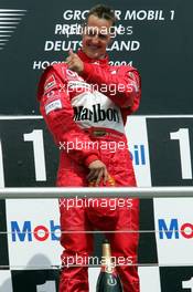 25.07.2004 Hockenheim, Germany, F1, Sunday. July, Michael Schumacher, GER, Ferrari - Formula 1 World Championship, Rd 12, Podium, Grosser Mobil 1 Preis von Deutschland, GER, Hockenheimring Baden-Württemberg