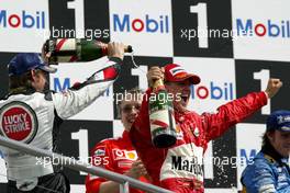 25.07.2004 Hockenheim, Germany, F1, Sunday. July, Jenson Button, GBR, BAR Honda and Michael Schumacher, GER, Ferrari - Formula 1 World Championship, Rd 12, Podium, Grosser Mobil 1 Preis von Deutschland, GER, Hockenheimring Baden-Württemberg