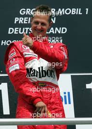 25.07.2004 Hockenheim, Germany, F1, Sunday. July, Michael Schumacher, GER, Ferrari - Formula 1 World Championship, Rd 12, Podium, Grosser Mobil 1 Preis von Deutschland, GER, Hockenheimring Baden-Württemberg