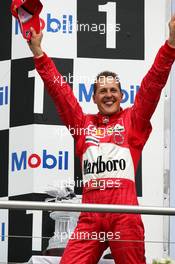 25.07.2004 Hockenheim, Germany,  F1, Sunday, Podium, Michael Schumacher (GER), Scuderia Ferrari Marlboro, Portrait (1st) - Formula 1 World Championship, Rd 12, Grosser Mobil 1 Preis von Deutschland, GER, Hockenheimring Baden-Württemberg