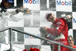 25.07.2004 Hockenheim, Germany, F1, Sunday. July, Jenson Button, GBR, BAR Honda and Michael Schumacher, GER, Ferrari - Formula 1 World Championship, Rd 12, Podium, Grosser Mobil 1 Preis von Deutschland, GER, Hockenheimring Baden-Württemberg