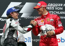 25.07.2004 Hockenheim, Germany, F1, Sunday. July, Jenson Button, GBR, BAR Honda, Michael Schumacher, GER, Ferrari - Formula 1 World Championship, Rd 12, Podium, Grosser Mobil 1 Preis von Deutschland, GER, Hockenheimring Baden-Württemberg