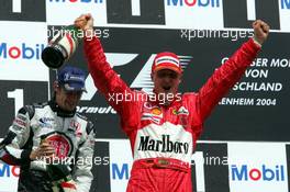 25.07.2004 Hockenheim, Germany, F1, Sunday. July, Michael Schumacher, GER, Ferrari, Jenson Button, GBR, BAR Honda - Formula 1 World Championship, Rd 12, Podium, Grosser Mobil 1 Preis von Deutschland, GER, Hockenheimring Baden-Württemberg