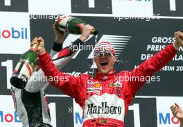 25.07.2004 Hockenheim, Germany, F1, Sunday. July, Michael Schumacher, GER, Ferrari, Jenson Button, GBR, BAR Honda  - Formula 1 World Championship, Rd 12, Podium, Grosser Mobil 1 Preis von Deutschland, GER, Hockenheimring Baden-Württemberg