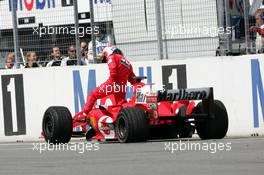 25.07.2004 Hockenheim, Germany,  F1, Sunday, Rubens Barrichello (BRA), Scuderia Ferrari Marlboro F2004, stopping immediately after the finish line with a flat left rear tyre - Formula 1 World Championship, Rd 12, Grosser Mobil 1 Preis von Deutschland, GER, Hockenheimring Baden-Württemberg