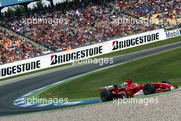 25.07.2004 Hockenheim, Germany, F1, Sunday. July, Michael Schumacher, GER, Scuderia Ferrari Marlboro, F2004, Action, Track - Formula 1 World Championship, Rd 12, Race, Grosser Mobil 1 Preis von Deutschland, GER, Hockenheimring Baden-Württemberg