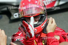 25.07.2004 Hockenheim, Germany, F1, Sunday. July, Michael Schumacher, GER, Ferrari, at Park Ferme - Formula 1 World Championship, Rd 12, Race, Grosser Mobil 1 Preis von Deutschland, GER, Hockenheimring Baden-Württemberg