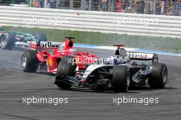 25.07.2004 Hockenheim, Germany,  F1, Sunday, Rubens Barrichello (BRA), Scuderia Ferrari Marlboro F2004, drives against David Coulthard (GBR), West McLaren Mercedes MP4-19B at the hairpin and looses his front wing - Formula 1 World Championship, Rd 12, Grosser Mobil 1 Preis von Deutschland, GER, Hockenheimring Baden-Württemberg