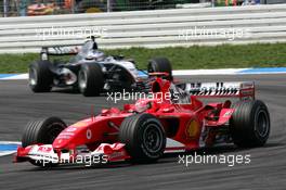 25.07.2004 Hockenheim, Germany,  F1, Sunday, Michael Schumacher (GER), Scuderia Ferrari Marlboro F2004, in front of Kimi Raikkonen (FIN), West McLaren Mercedes MP4-19B - Formula 1 World Championship, Rd 12, Grosser Mobil 1 Preis von Deutschland, GER, Hockenheimring Baden-Württemberg