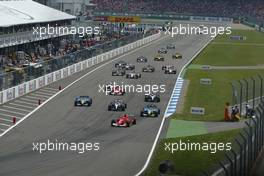 25.07.2004 Hockenheim, Germany, F1, Sunday. July, Michael Schumacher, GER, Scuderia Ferrari Marlboro, F2004, Action, Track leads the field - Formula 1 World Championship, Rd 12, The Start of the Race,  Grosser Mobil 1 Preis von Deutschland, GER, Hockenheimring Baden-Württemberg