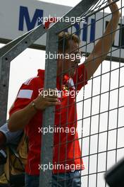 24.07.2004 Hockenheim, Germany, F1, Saturday, July, Michael Schumacher, GER, Ferrari waves to the crowd - Formula 1 World Championship, Rd 12, Qualifying, Grosser Mobil 1 Preis von Deutschland, GER, Hockenheimring Baden-Württemberg