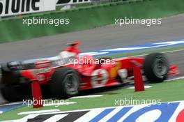 24.07.2004 Hockenheim, Germany, F1, Saturday, July, many drivers had problems at the first corners RED PLASTIC BARRIERS, Michael Schumacher, GER, Scuderia Ferrari Marlboro, F2004, Action, Track - Formula 1 World Championship, Rd 12, Practice, Grosser Mobil 1 Preis von Deutschland, GER, Hockenheimring Baden-Württemberg