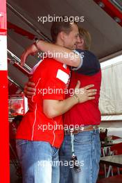 24.07.2004 Hockenheim, Germany, F1, Saturday, July, Michael Schumacher, GER, Ferrari is congratulated on being on pole - Formula 1 World Championship, Rd 12, Qualifying, Grosser Mobil 1 Preis von Deutschland, GER, Hockenheimring Baden-Württemberg