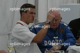 24.07.2004 Hockenheim, Germany, F1, Saturday, July, Ralf Schumacher, GER, BMW WilliamsF1 talking with Sid Watkins, GBR, Prof., FIA Doctor, Medical Delegate, Portrait - Formula 1 World Championship, Rd 12, Grosser Mobil 1 Preis von Deutschland, GER, Hockenheimring Baden-Württemberg