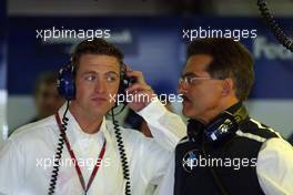 24.07.2004 Hockenheim, Germany, F1, Saturday, July, Ralf Schumacher, GER, BMW WilliamsF1 comes and visits the Williams team whilst he is injured. Mario Theissen, Dr., GER, BMW Motorsport Director - Formula 1 World Championship, Rd 12, Grosser Mobil 1 Preis von Deutschland, GER, Hockenheimring Baden-Württemberg