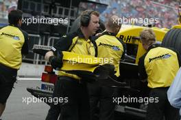 24.07.2004 Hockenheim, Germany, F1, Saturday, July, Mick Gomme takes Giorgio Pantano, ITA, Jordan front wing back into the pits - Formula 1 World Championship, Rd 12, Practice, Grosser Mobil 1 Preis von Deutschland, GER, Hockenheimring Baden-Württemberg