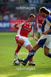 21.07.2004 Mannheim, Deutschland, "Spiel des Herzens", here: Michael Schumacher, GER - Fair Play für Kinder in Not at Carl-Benz-Stadion Mannheim, the F1 Superstars (Michael Schumacher) plays against the RTL-Superstars, Charity, RTL Stiftung "Kinder in Not", UNESCO, before the Formula 1 World Championship, Rd 12, Grosser Mobil 1 Preis von Deutschland, GER, Hockenheimring Baden-Württemberg