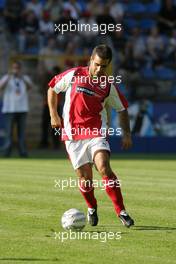 21.07.2004 Mannheim, Deutschland, "Spiel des Herzens", here: Zsolt Baumgartner, HUN, Minardi - Fair Play für Kinder in Not at Carl-Benz-Stadion Mannheim, the F1 Superstars (Michael Schumacher) plays against the RTL-Superstars, Charity, RTL Stiftung "Kinder in Not", UNESCO, before the Formula 1 World Championship, Rd 12, Grosser Mobil 1 Preis von Deutschland, GER, Hockenheimring Baden-Württemberg