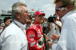 25.07.2004 Hockenheim, Germany, F1, Sunday. July, Willi Weber, GER, Driver - Manager, Portrait and BORIS BECKER - Formula 1 World Championship, Rd 12, Grosser Mobil 1 Preis von Deutschland, GER, Hockenheimring Baden-Württemberg