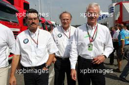 25.07.2004 Hockenheim, Germany, F1, Sunday. July, Mario Theissen, Dr., GER, BMW Motorsport Director, Dr Burkhard Goeschel (Board member for Development BMW Group), Dr Helmut Panke ( Chairman of the Board BMW Group) - Formula 1 World Championship, Rd 12, Grosser Mobil 1 Preis von Deutschland, GER, Hockenheimring Baden-Württemberg