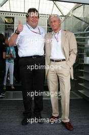 25.07.2004 Hockenheim, Germany,  F1, Sunday, Norbert Haug (GER), Sporting Director Mercedes-Benz (left) with Prof. Jürgen Hubbert (GER), Board of Management DaimlerChrysler, who celebrates his 65th birthday - Formula 1 World Championship, Rd 12, Grosser Mobil 1 Preis von Deutschland, GER, Hockenheimring Baden-Württemberg