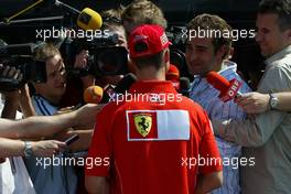 22.07.2004 Hockenheim, Germany, F1, Thursday, July, Michael Schumacher, GER, Ferrari gets interviewed - Formula 1 World Championship, Rd 12, Grosser Mobil 1 Preis von Deutschland, GER, Hockenheimring Baden-Württemberg