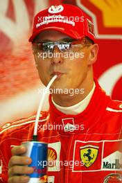 13.08.2004 Budapest, Hungary, F1, Friday, August, Michael Schumacher, GER, Scuderia Ferrari Marlboro, F2004, Pitlane, Box, Garage - Formula 1 World Championship, Practice, Rd 13, Hungarian Grand Prix, HUN, Hungaroring