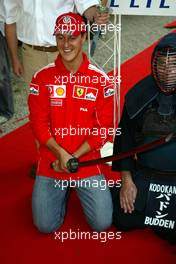 10.09.2004 Monza, Italy F1, Friday, September, Michael Schumacher, GER, Ferrari with a sword - Formula 1 World Championship, Rd 15, Italian Grand Prix, ITA, Italy