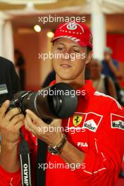 10.09.2004 Monza, Italy F1, Friday, September, Olympus Event in the evening - Michael Schumacher, GER, Ferrari  and Rubens Barrichello, BRA, Ferrari - Formula 1 World Championship, Rd 15, Italian Grand Prix, ITA, Italy