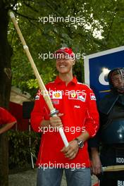 10.09.2004 Monza, Italy F1, Friday, September, Olympus Event in the evening - Michael Schumacher, GER, Ferrari  and Rubens Barrichello, BRA, Ferrari - Formula 1 World Championship, Rd 15, Italian Grand Prix, ITA, Italy